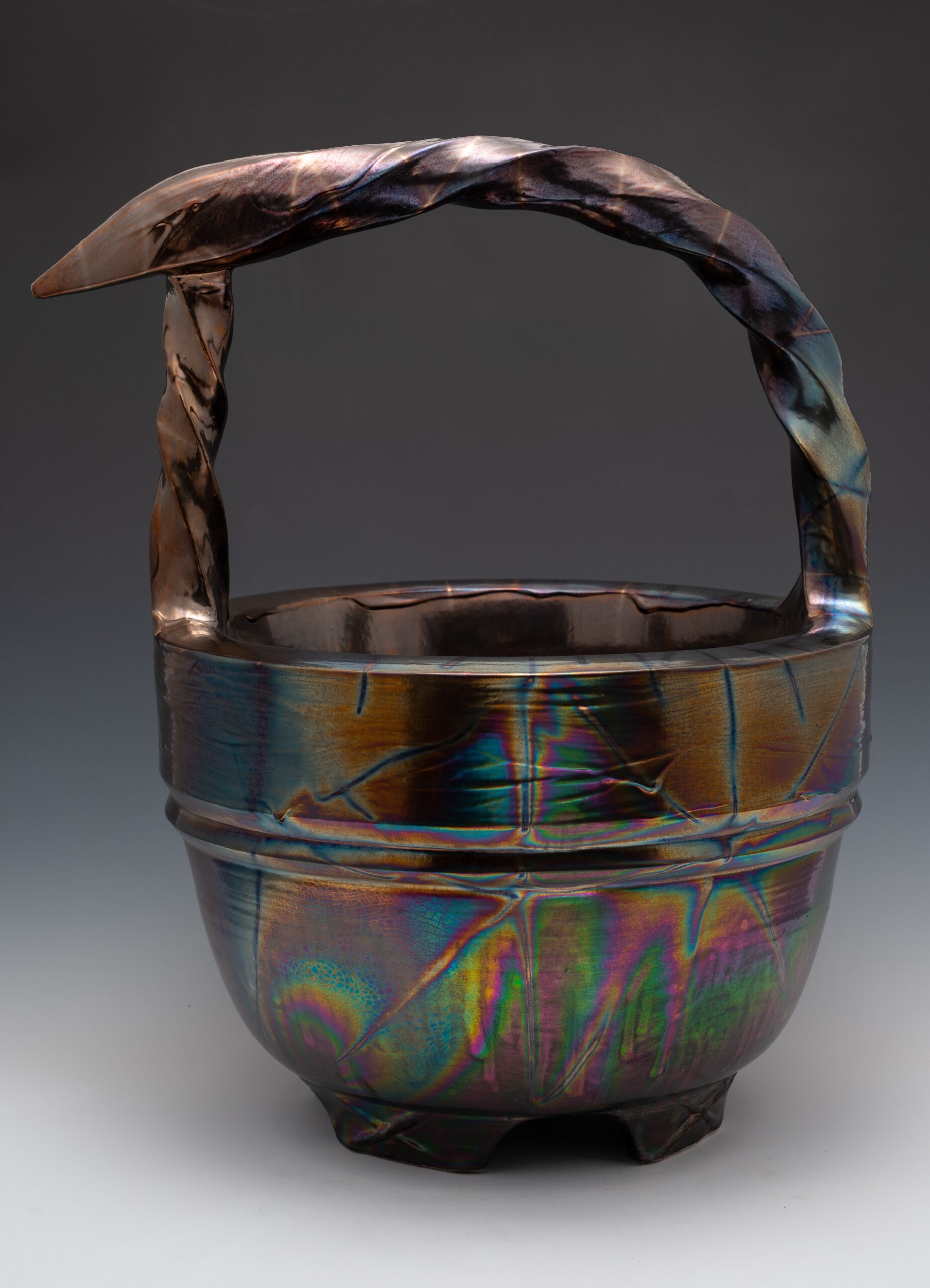 # 10 - Fumed stoneware, double-walled bird basket